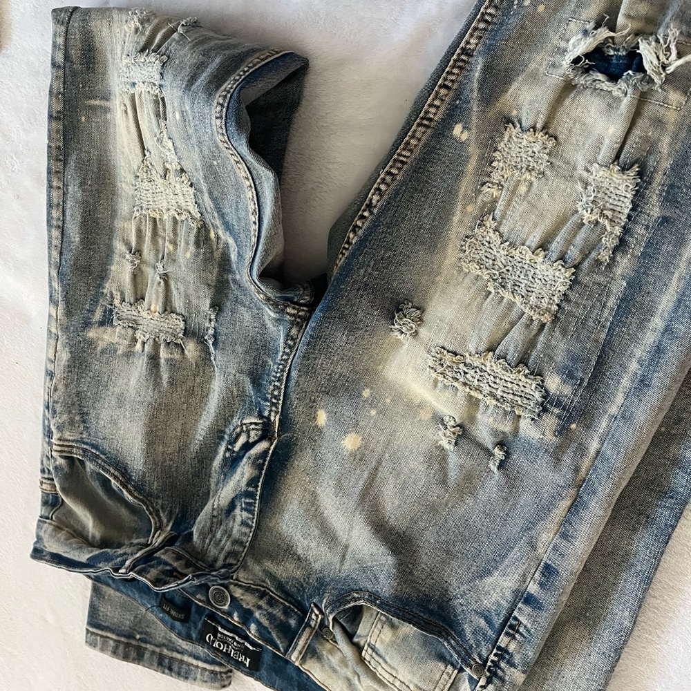 Faded Blue Distressed Skinny Jeans
